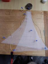 Uchycení obou dílů sítě na podložku